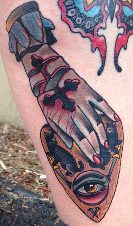 Gary Dunn - traditional  cut hand with planchette  color tattoo. Art Junkies tattoo Gary Dunn